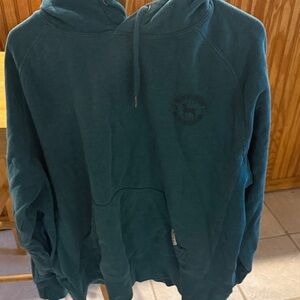 The Black Dog Teal Pullover Hoodie with Subtle Logo